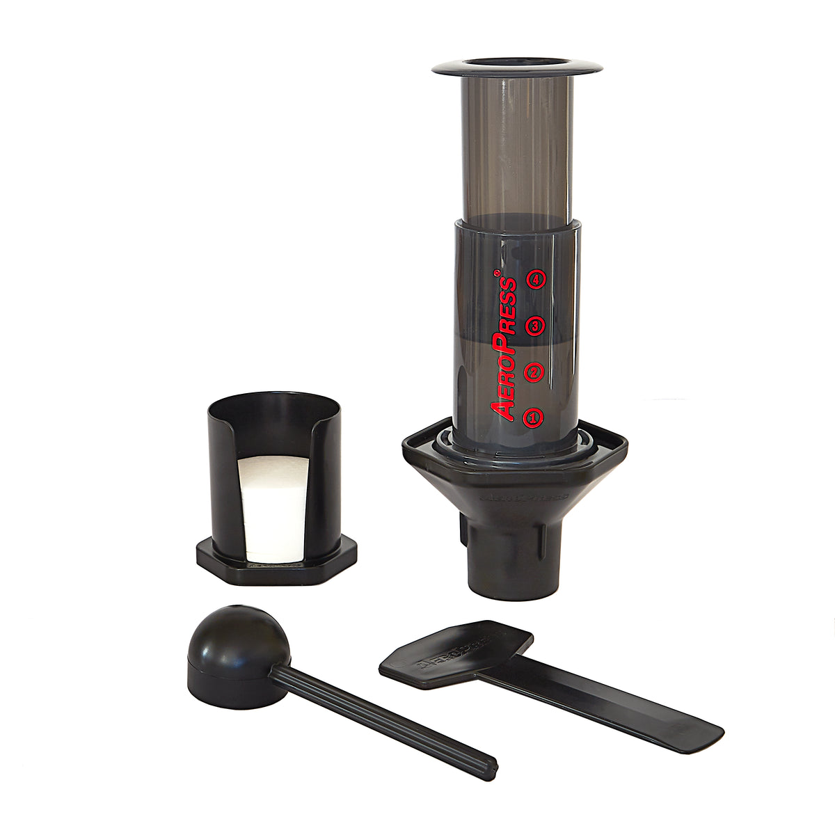 Aeropress Kaffeebereiter mit Filtern und Inhalt